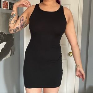 TNA black bodycon dress with a lower back cutout